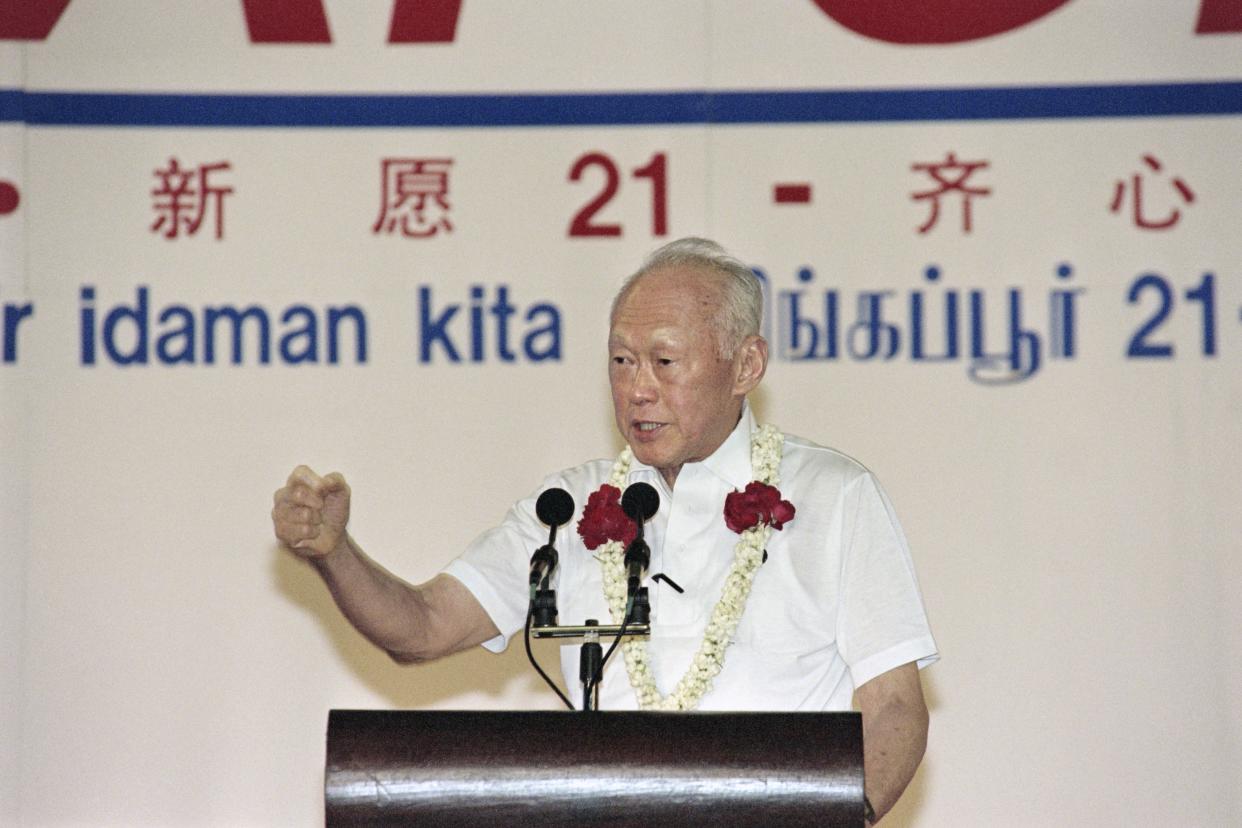 Singapore Senior minister Lee Kuan Yew addresses on December 30, 1996 the public at the People's Action Party rally in Hougang stadium. Singapore's durable patriarch Lee has won another five-year termas an MP without a fight, guaranteeing him a continuedrole in Singapore.   AFP PHOTO ROSLAN RAHMAN        (Photo credit should read ROSLAN RAHMAN/AFP via Getty Images)