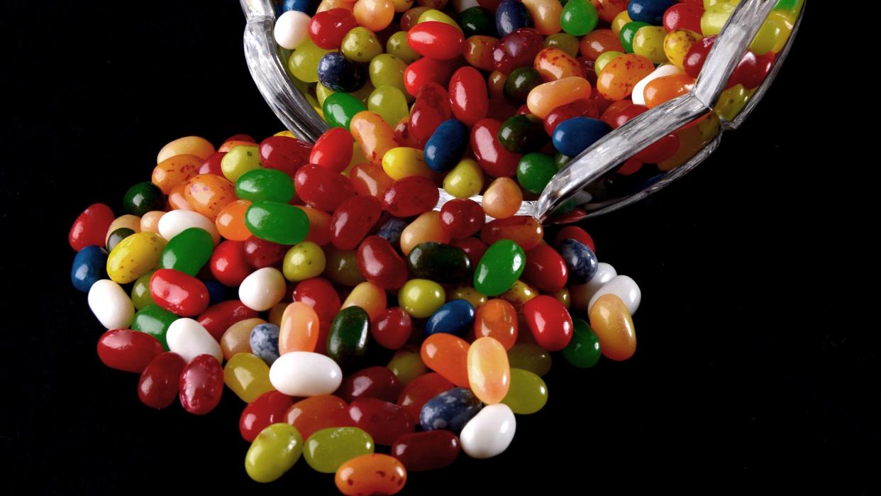 jelly beans spilling out of a bowl