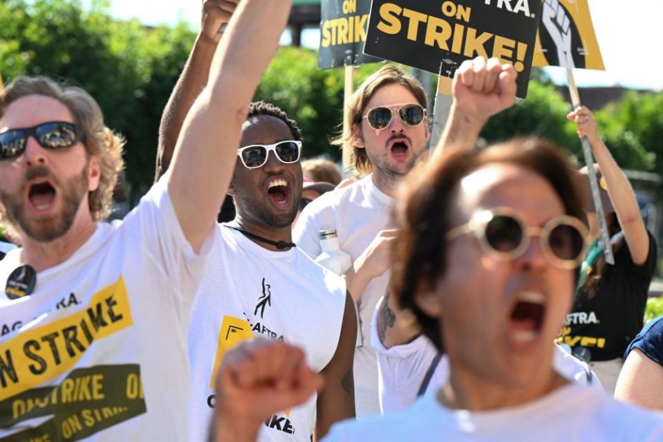 Sag-Aftra members and supporters picket outside Paramount Studios.