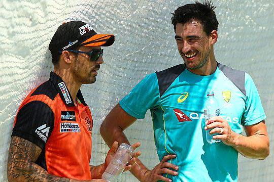 Plan of attack | Mitchell Johnson, England’s nemesis four years ago, chats to new Aussie pace hero Mitchell Starc at practice in Perth this morning: Paul Kane/Getty Images