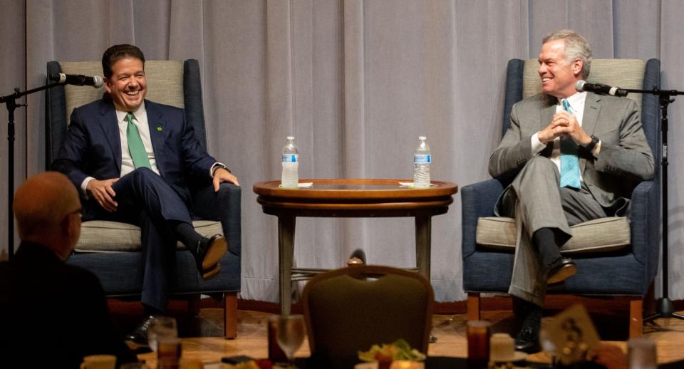 Leo Salom, left, president and CEO of TD Bank, and Bryan Jordan, right, president and CEO of First Horizon, speak during a luncheon Monday, Aug. 1, 2022, at the Holiday Inn University of Memphis. The pair made their first joint public appearance at the luncheon after an agreement was reached in February 2022 concerning a $13.4 billion proposed merger between the two companies.
