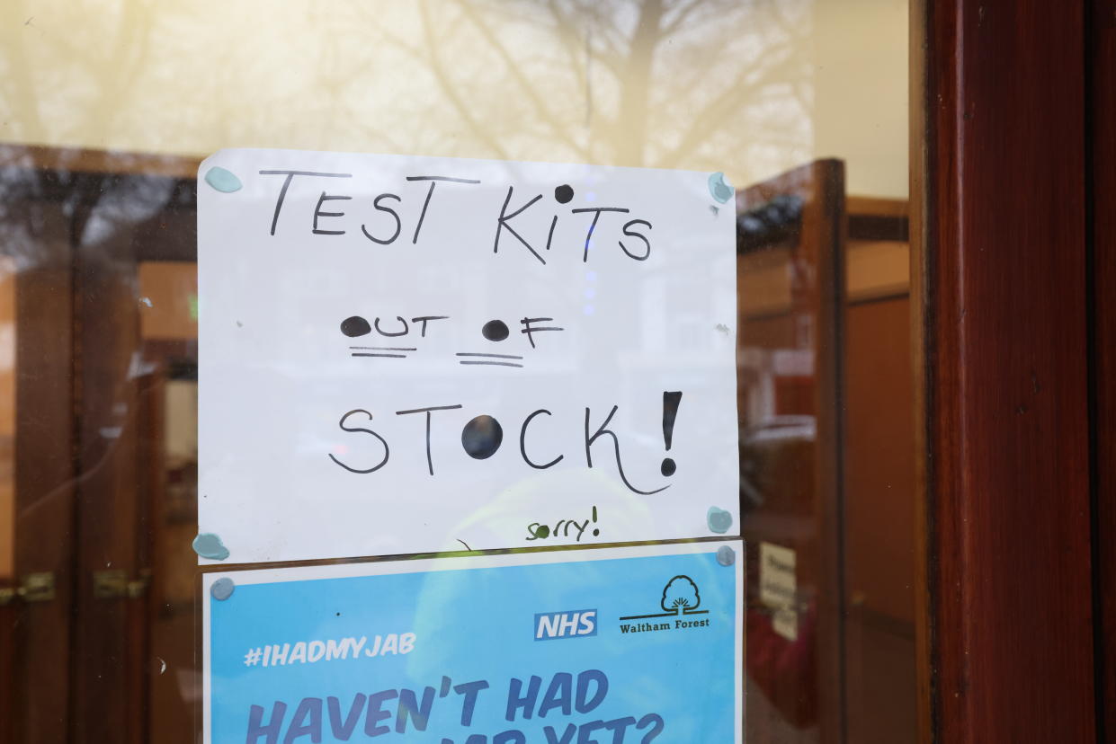 A sign warning that take away lateral flow test kits are out of stock on the window of a Covid test centre at Chingford Assembly Hall, London. Picture date: Thursday December 30, 2021.