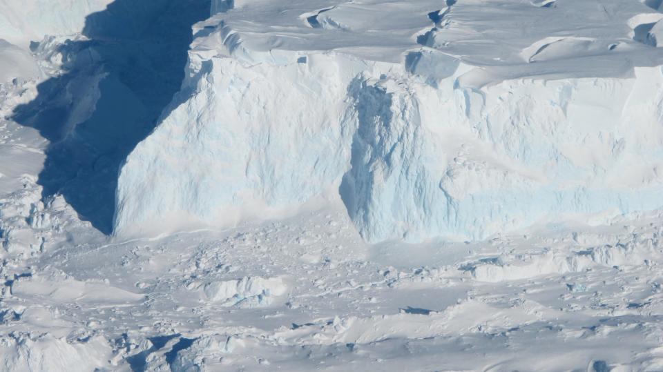 The outer edge of the Thwaites Glacier. As the glacier flows into the ocean, it becomes sea ice and drives up sea-level. Thwaites Glacier's ice is flowing particularly fast, and some researchers believe it may have already tipped into instability or be near that point.