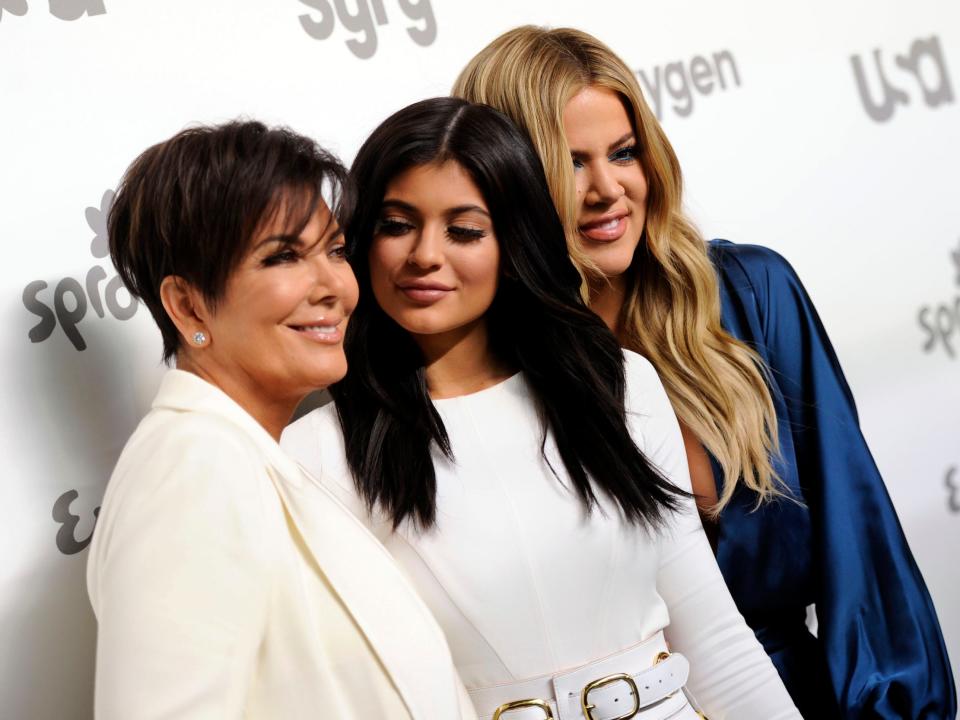 Kris Jenner stands with, from left, Kylie Jenner and Khloe Kardashian at the NBCUniversal Cable Entertainment event in 2015. The three are being sued by Rob Kardashian's former fiancee, Blac Chyna