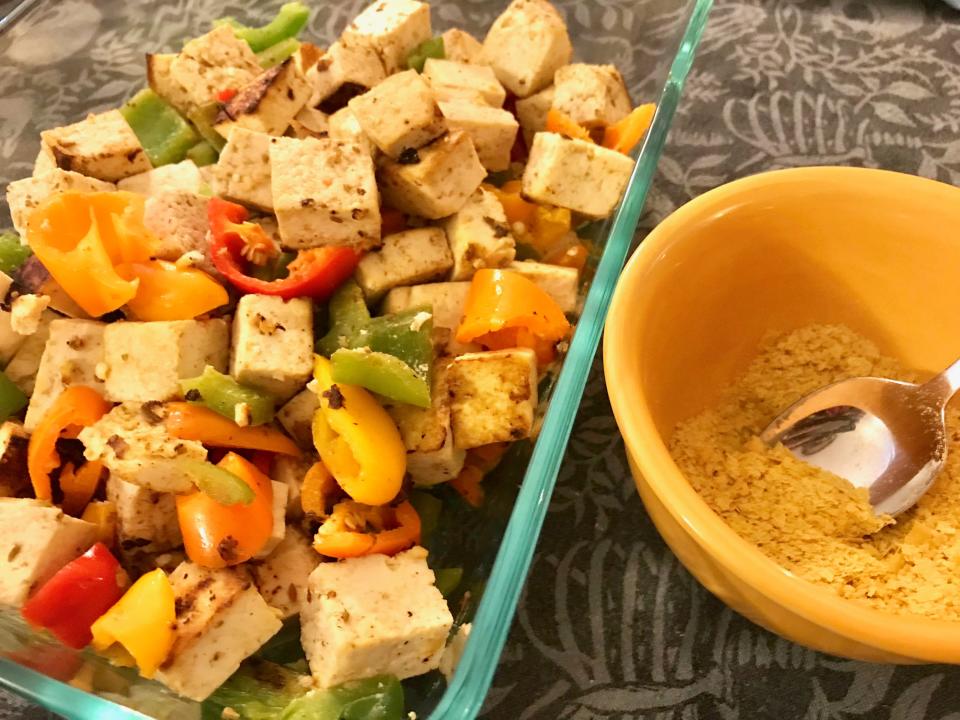 Grill-Style Tofu and Peppers can be garnished with a sprinkle of nutritional yeast or vegan Parmesan, if desired.