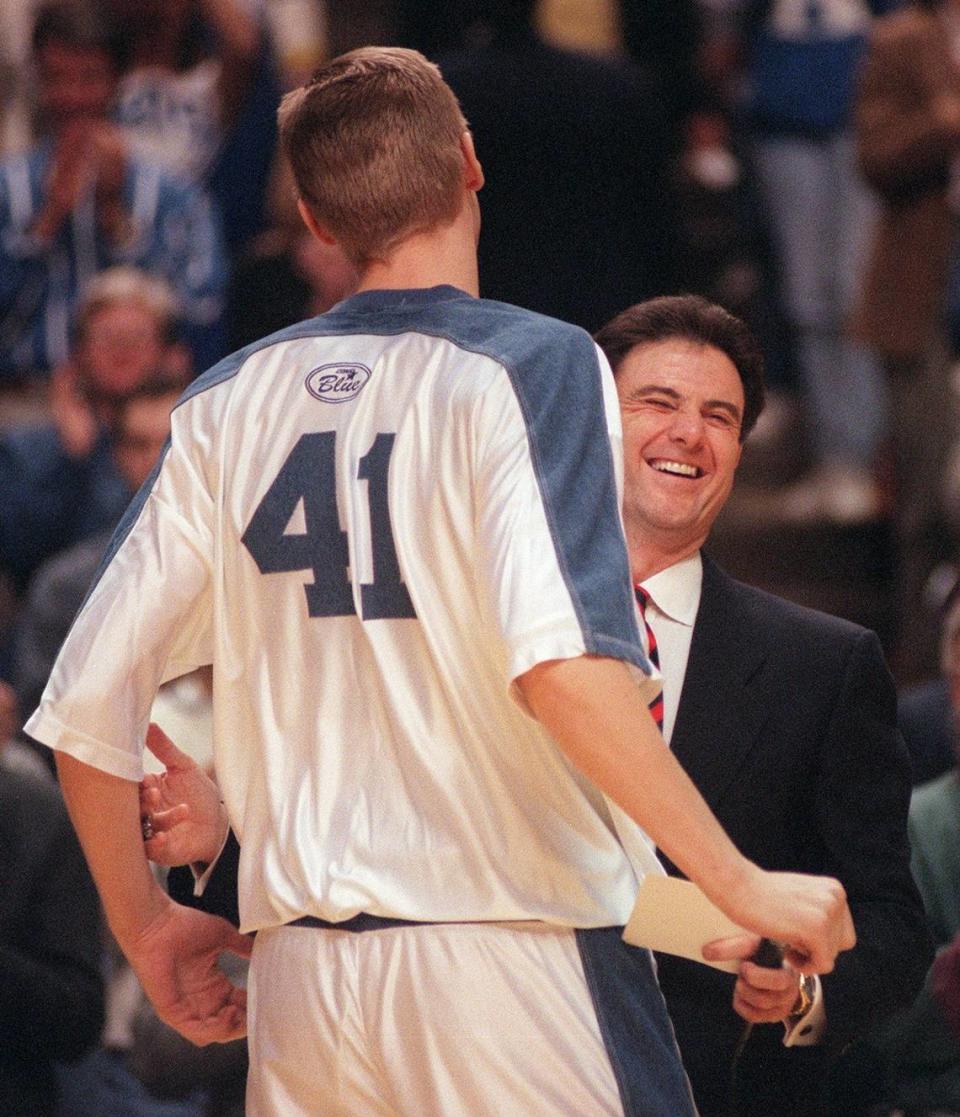 Kentucky coach Rick Pitino laughed with Mark Pope during the Cats’ Senior Night festivities in Rupp Arena in 1996. Mark Cornelison/Herald-Leader File Photo