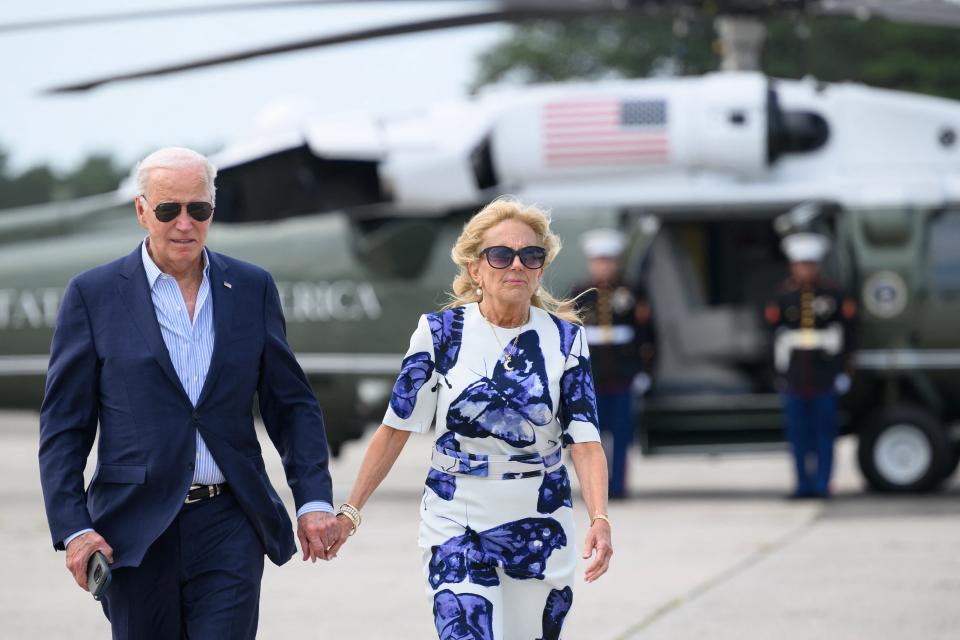 President Joe Biden and First Lady Jill Biden walk from Marine One to board Air Force One at Francis S. Gabreski Airport in Westhampton Beach, New York on June 29, 2024.