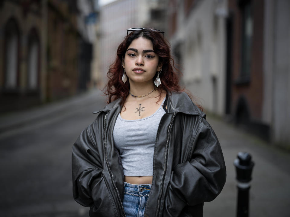 Hasselblad 907X & CFV 100C sample image – street portrait of a young person wearing a leather jacket and sunglasses