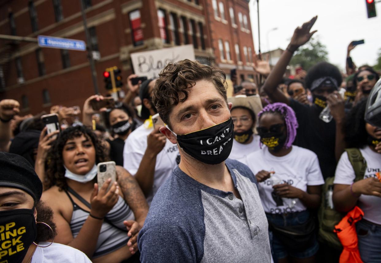 Minneapolis Mayor Jacob Frey leaves after coming to speak during a demonstration calling for the police department to be defunded on June 6. Mayor Frey declined when he was asked if he would fully defund the police and was then asked to leave the protest. (Photo by Stephen Maturen/Getty Images): Getty Images