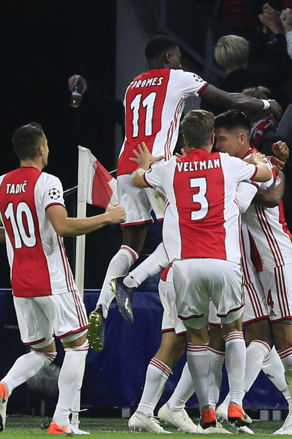 Ajax players celebrate scoring their second goal during the group H Champions League soccer match between Ajax and LOSC Lille at Johan Cruyff ArenA in Amsterdam, Netherlands, Tuesday, Sept. 17, 2019. (AP Photo/Peter Dejong)