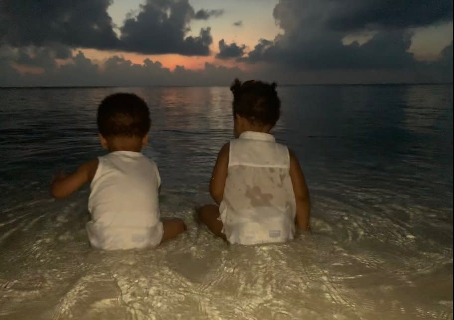 Sunset: one photo showed the twins splashing in the waves (beyonce.com)