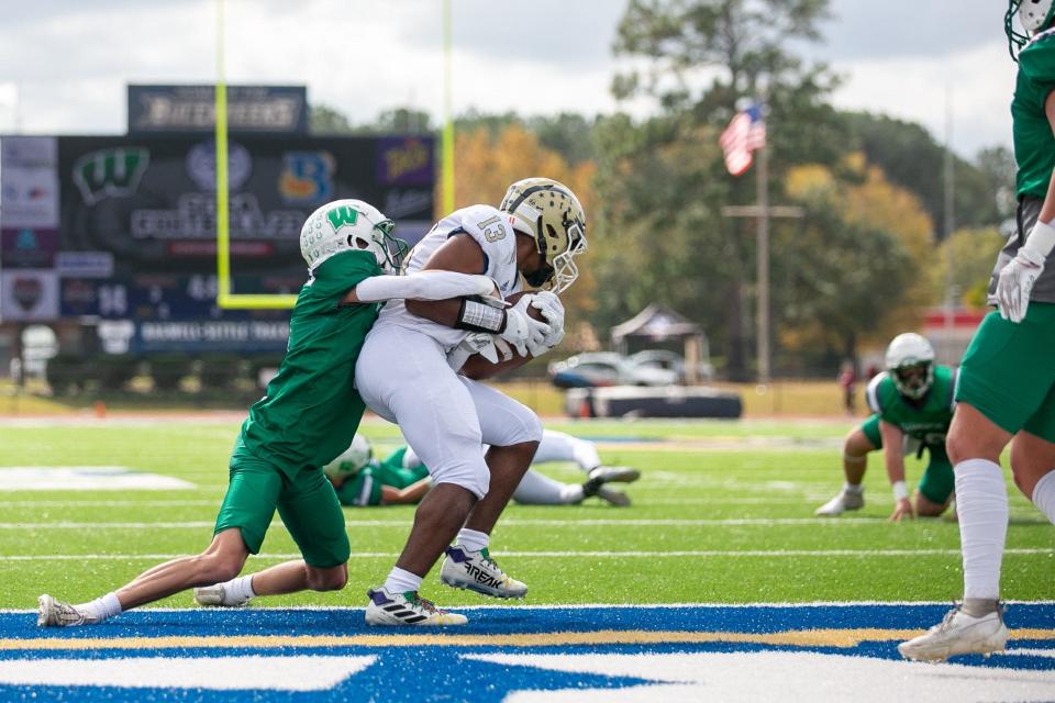 Bethesda's Thomas Peters secures a touchdown catch from Triston Randall in the Blazers' win over Williamsburg Academy in the SCISA Class 2A state title game at Charleston Southern Saturday.