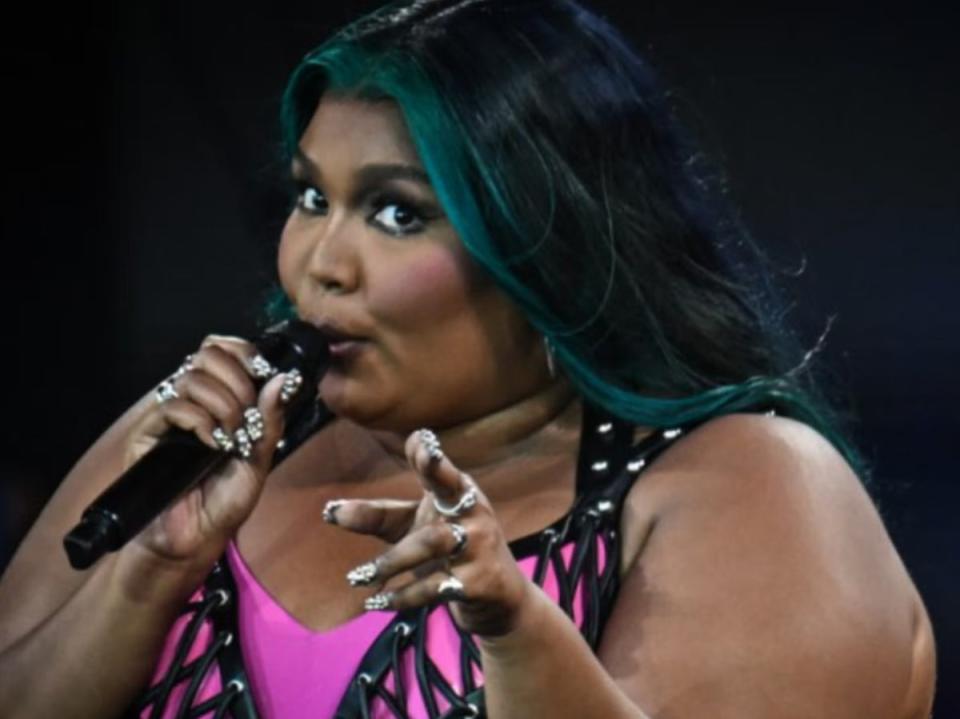Lizzo performing at Glastonbury 2023 (Photo by OLI SCARFF/AFP via Getty Images)