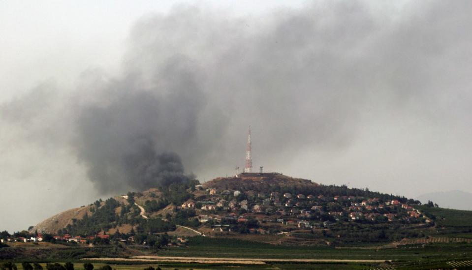 TOPSHOT - A photo taken from the southern Lebanese border town of Marjayoun on June 14, 2024 shows smoke billowing from Metullah on the Israeli side after being targeted by rockets from Lebanon. Fallout from the Gaza war is regularly felt on the Israeli-Lebanon frontier, where deadly cross-border exchanges have escalated. (Photo by Rabih DAHER / AFP) (Photo by RABIH DAHER/AFP via Getty Images)