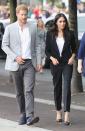 <p>The Californian beauty changed into a bespoke fitted black suit and white tee by Givenchy during her trip to Ireland. She coordinated the outfit with a gold buckle Givenchy belt, as well as carrying a £1,690 Givenchy clutch bag and a pair of black Sarah Flint stilettos. </p>