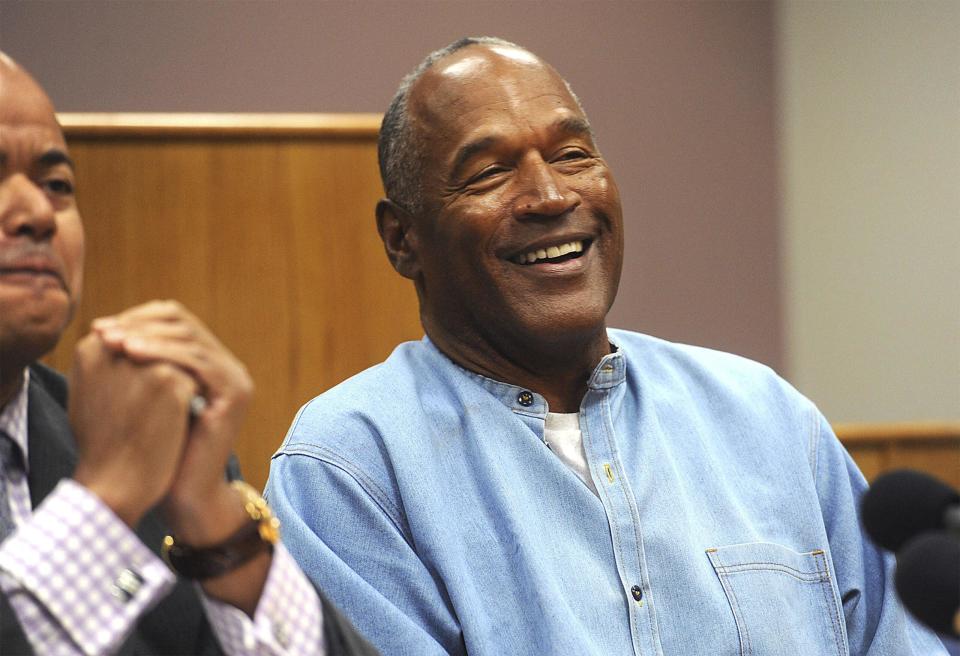 A Look Back At O.J. Simpson's Life: NFL Career, Infamous Car Chase, & More