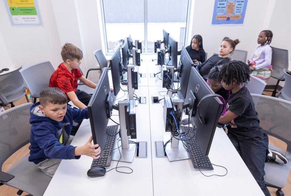 Kids work inside the computer tech lab at the Boys & Girls Club of Massillon.