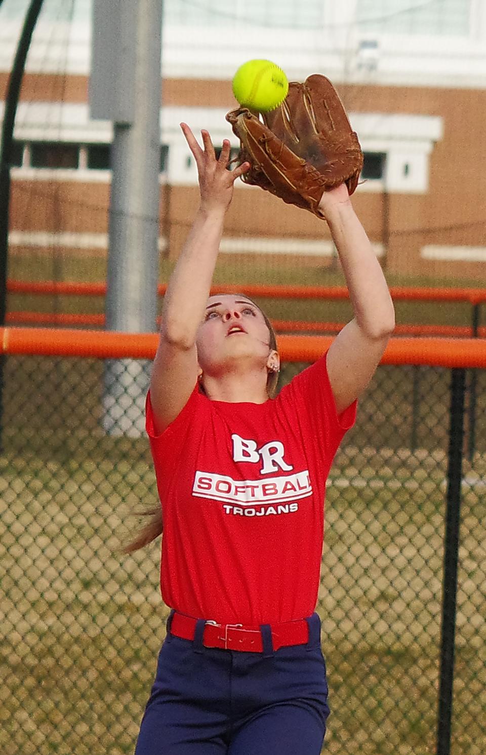 Abby Campbell of Bridgewater-Raynham makes the catch while backing up to short right field during the softball scrimmage with Middleboro on Monday, March 27, 2023.