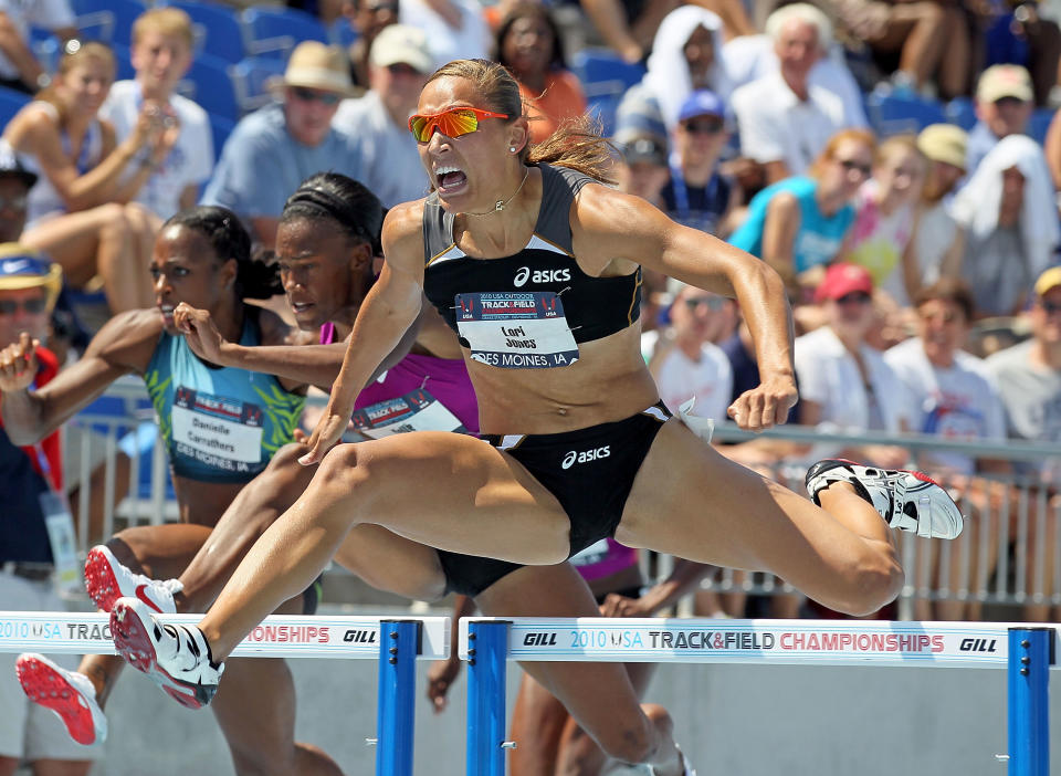 Lolo Jones clears a hurdle on the way to victory in the Womens 100 Meter Hurdles during the 2010 USA Outdoor Track & Field Championships at Drake Stadium on June 26, 2010 in Des Moines, Iowa. (Photo by Andy Lyons/Getty Images)