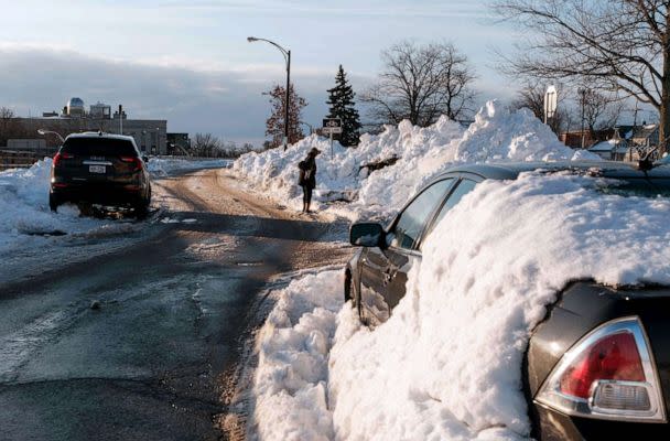 PHOTO: A car makes its way on Humboldt Parkway in Buffalo, New York, Dec. 29, 2022. (Joed Viera/AFP via Getty Images)