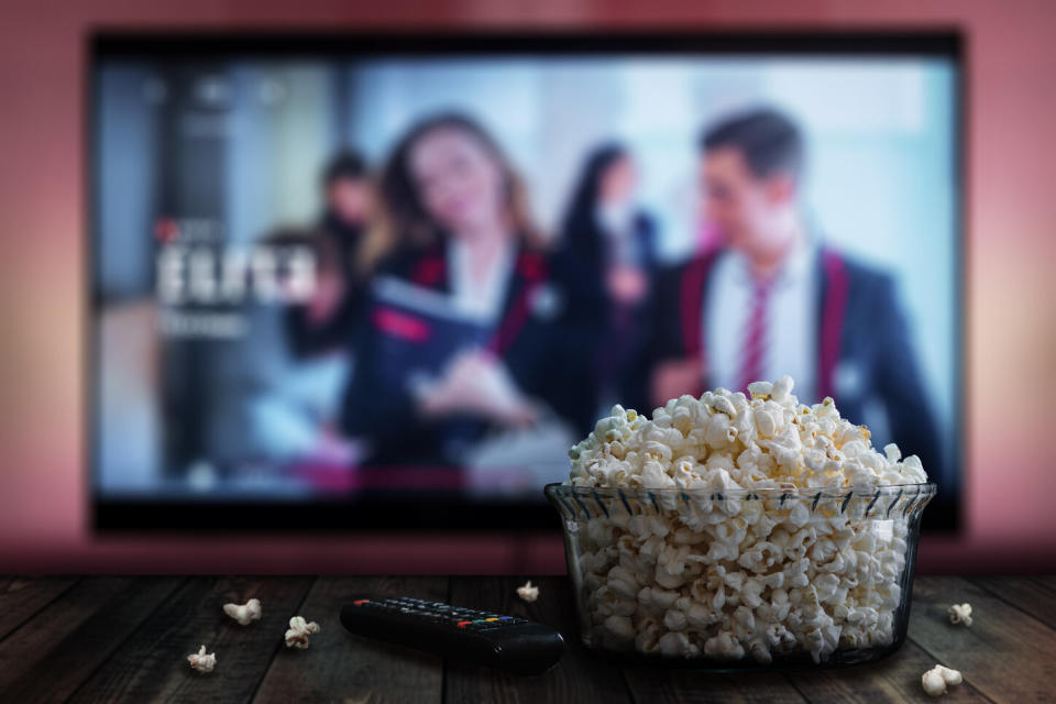 Netflix TV screen with popcorn bowl