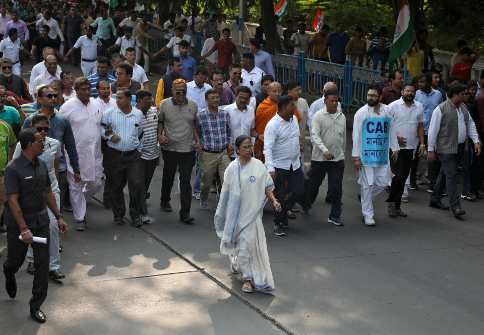 Mamata Banerjee, the Chief Minister of West Bengal, and her party supporters attend a protest march against the National Register of Citizens (NRC) and a new citizenship law, in Kolkata, India, December 16, 2019. REUTERS/Rupak De Chowdhuri