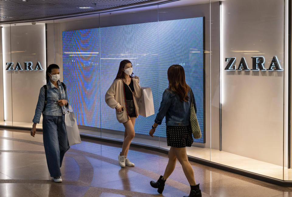 Shoppers walk past the Spanish multinational clothing design retail company by Inditex, Zara store in Hong Kong. (Photo by Budrul Chukrut / SOPA Images/Sipa USA)(Sipa via AP Images) - Credit: Sipa USA/ AP