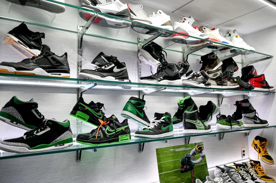 Michigan State football coach Mel Tucker's sneaker collection displayed in his office on Monday, March 28, 2022, at the Skandalaris Football Center in East Lansing.