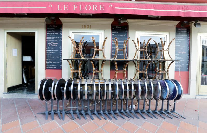 FILE PHOTO: Tables and chairs are seen on the terrace of a restaurant as France's Prime Minister announced to close most all non-indispensable locations due to concerns over the coronavirus disease (COVID-19), in Nice