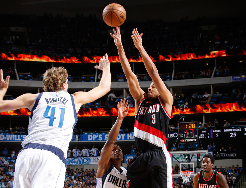 C.J. McCollum and Dirk Nowitzki went shot-for-shot down the stretch on Tuesday. (Getty Images)