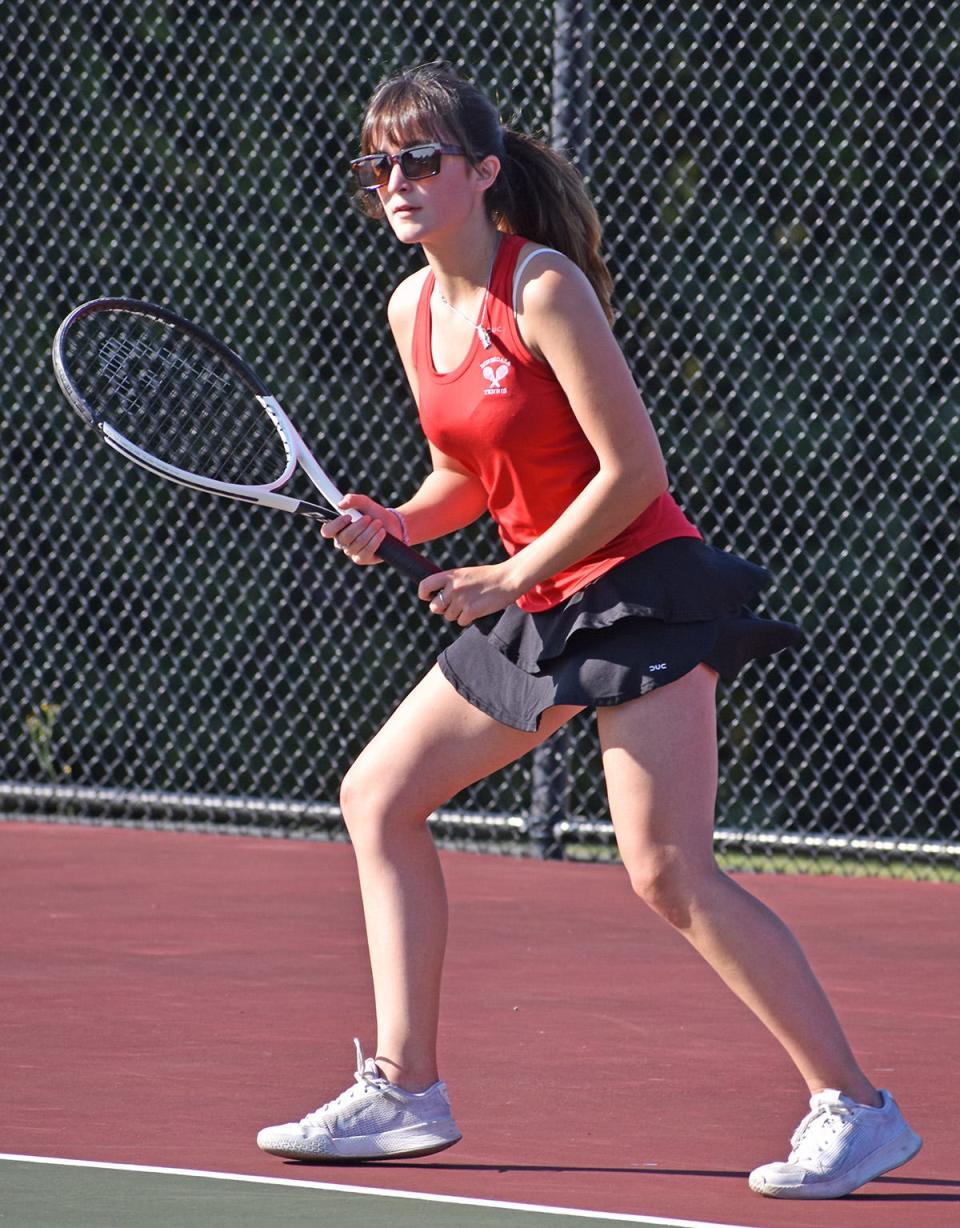 Senior co-captain Morgan Wendell lurks on the baseline looking to deliver a forehand winner against Western Wayne.