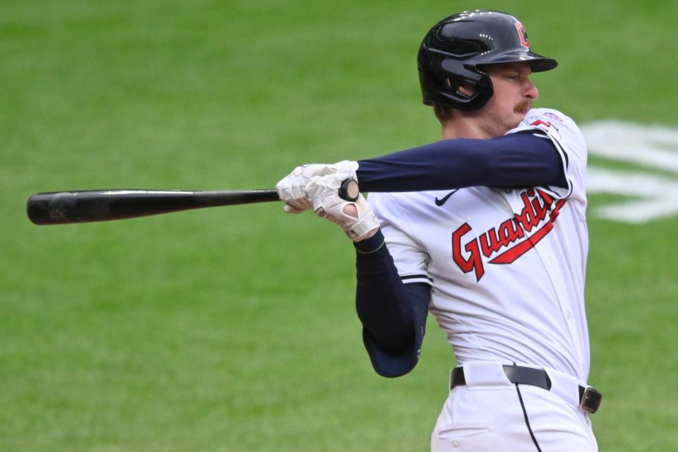 Cleveland Guardians designated hitter Kyle Manzardo (9) swings during his first MLB at-bat in the second inning Monday against the Detroit Tigers in Cleveland.