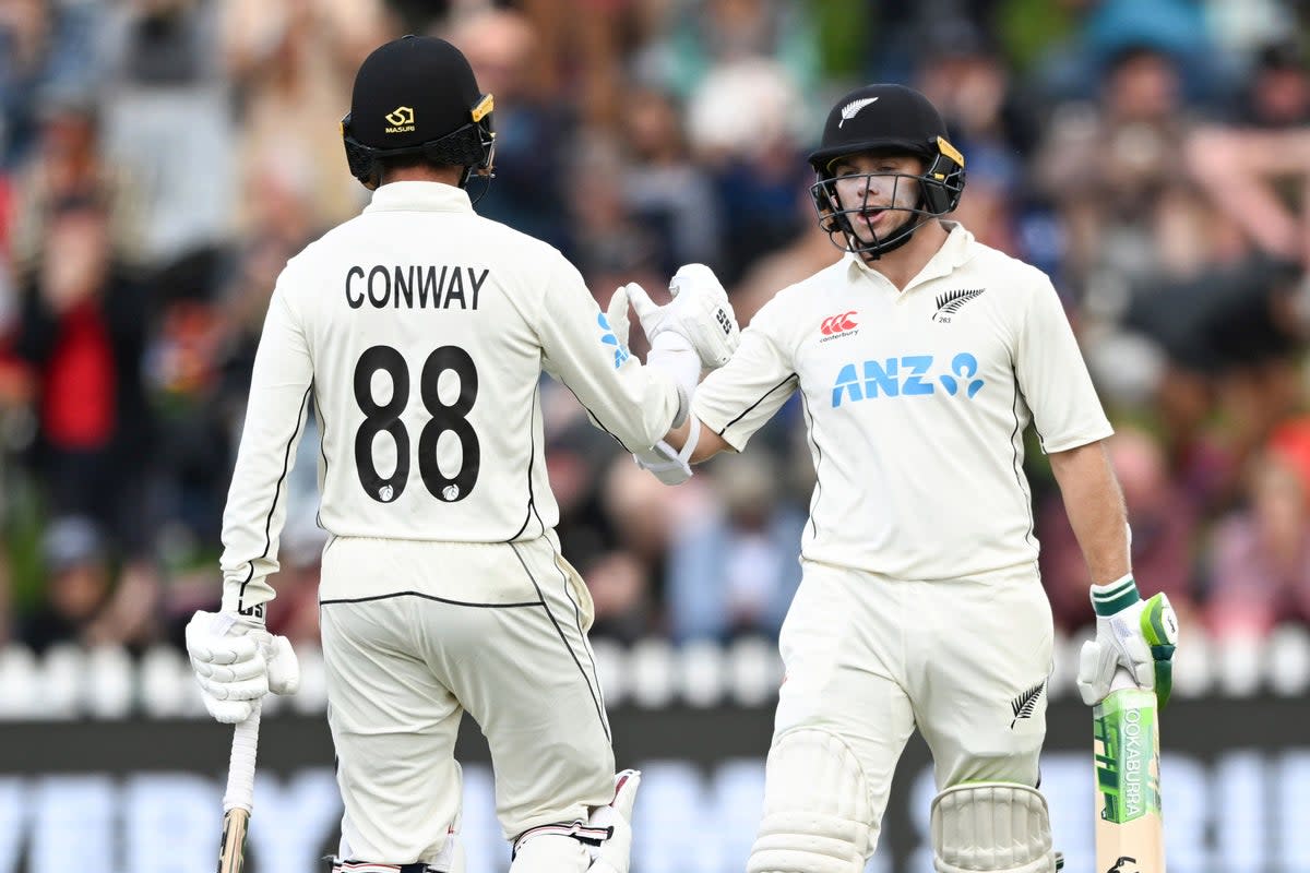 Tom Latham, right, and Devon Conway defield England (Andrew Cornaga/Photosport/AP) (AP)