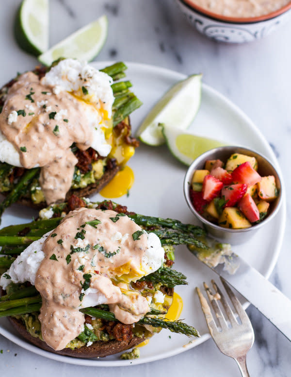 <strong>Get the <a href="http://www.halfbakedharvest.com/cotija-guacamole-chorizo-eggs-benedict-honey-chipotle-lime-sauce/" target="_blank">Cotija Guacamole + Chorizo Eggs Benedict with Honey Chipotle Lime Sauce recipe</a> from Half Baked Harvest</strong>