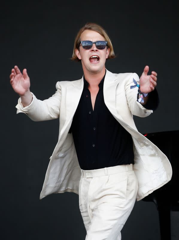 FILE PHOTO: British Singer Tom Odell performs on the Pyramid Stage during Glastonbury Festival in Somerset