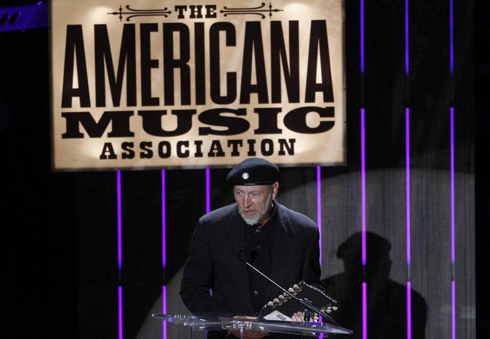 FILE - Richard Thompson accepts the Lifetime Achievement Songwriting Award at the 11th annual Americana Honors & Awards in Nashville on Sept. 12, 2012. Thompson's book "Beeswing: Losing My Way and Finding My Voice 1967–1975" released on April 6. (Photo by Wade Payne/Invision/AP, File)