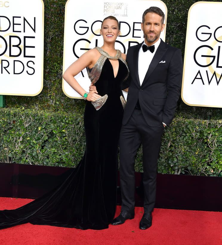 Blake Lively and Ryan Reynolds during the 74th Golden Globes Awards. (Photo: Getty Images.) 