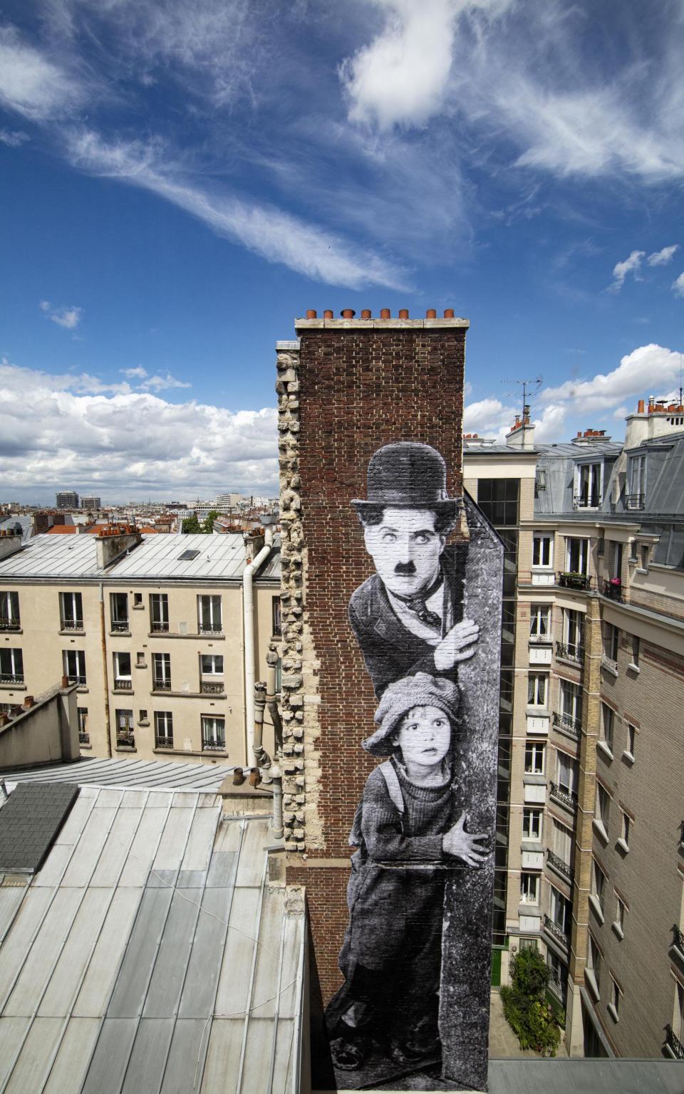 The exterior of Hotel Paradiso, complete with Charlie Chaplin mural  - Romain Ricard