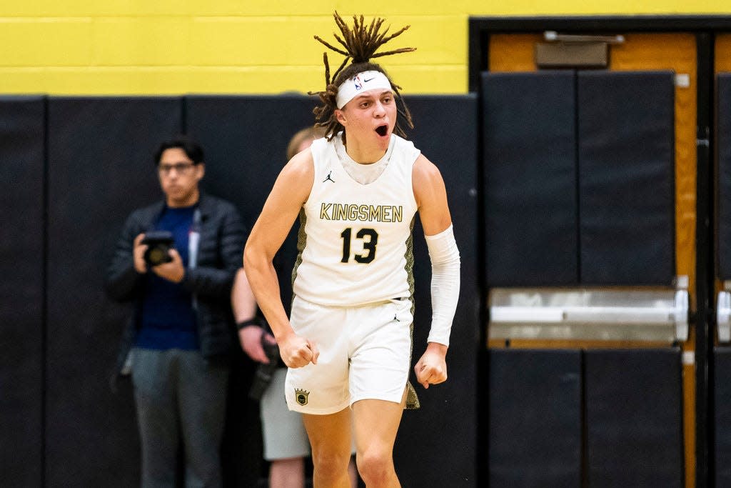 Penn's Dominic Bonner (13) celebrates during the Penn vs. Riley boys basketball game Friday, Jan. 26, 2024 at Penn High School in Mishawaka.