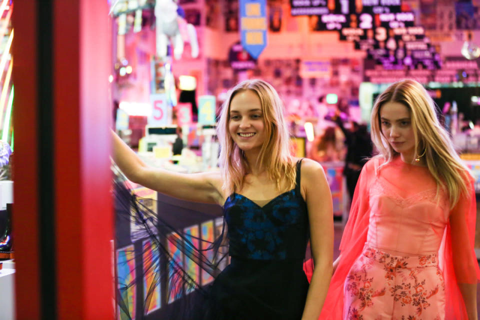 Models in Stella McCartney’s autumn 2016 collection at Amoeba Music in Los Angeles.