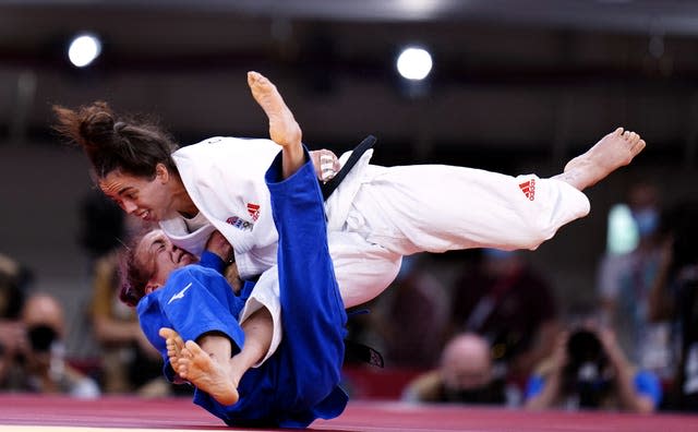 14 members of Giles' family gathered to watch her bring home the bronze medal 