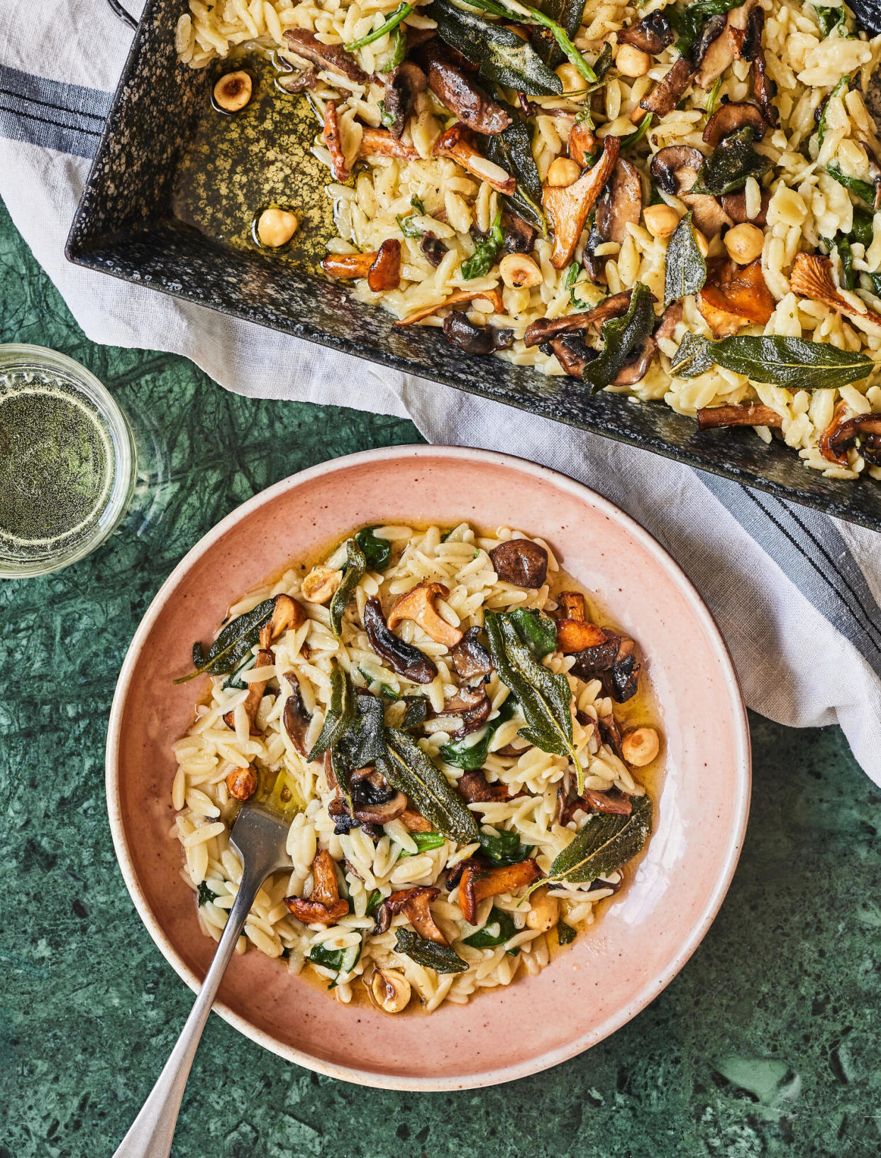 <span>Rukmini Iyer’s wild mushroom, spinach and hazelnut orzotto.</span><span>Photograph: Emma Guscott/The Guardian. Food stylist: El Kemp. Prop stylist: Anna Wilkins. Food stylist assistant: Jessica Ransom.</span>