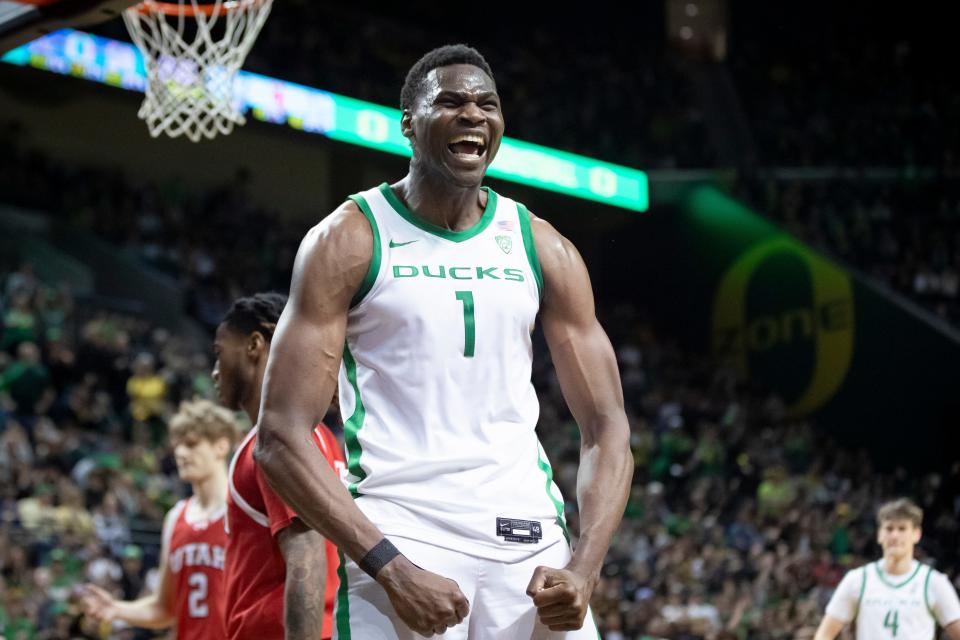 Oregon center N'Faly Dante celebrates a dunk as the Oregon Ducks host the Utah Utes Saturday, March 9, 2024 at Matthew Knight Arena in Eugene, Ore.