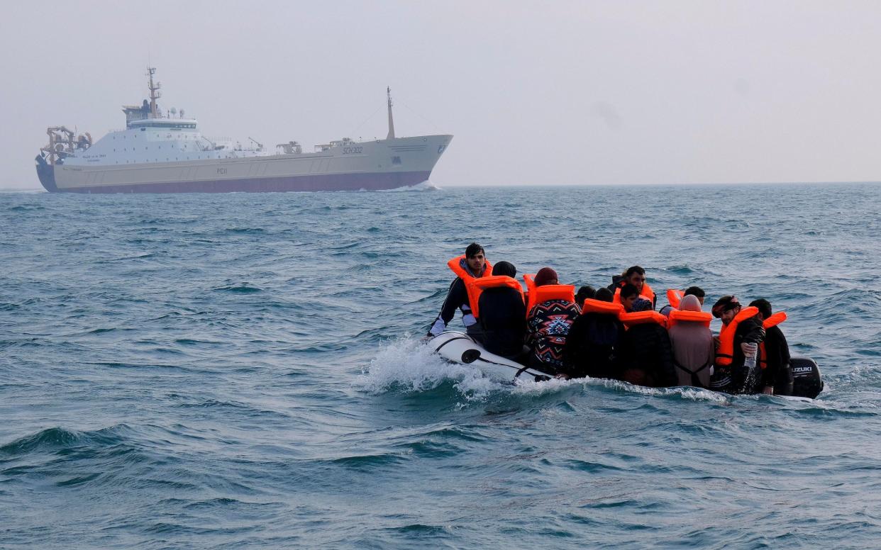 Sixteen migrants on board a dinghy seen heading for the UK on Wednesday  - Steve Finn 