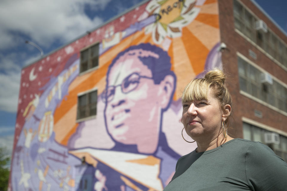 Principal Amy Williams poses for a portrait outside of William Dick Elementary in North Philadelphia on Thursday, May 6, 2021. Teachers and staff at the school took extraordinary measures to keep attendance high this school year despite the challenges of learning online. (Heather Khalifa/The Philadelphia Inquirer via AP)