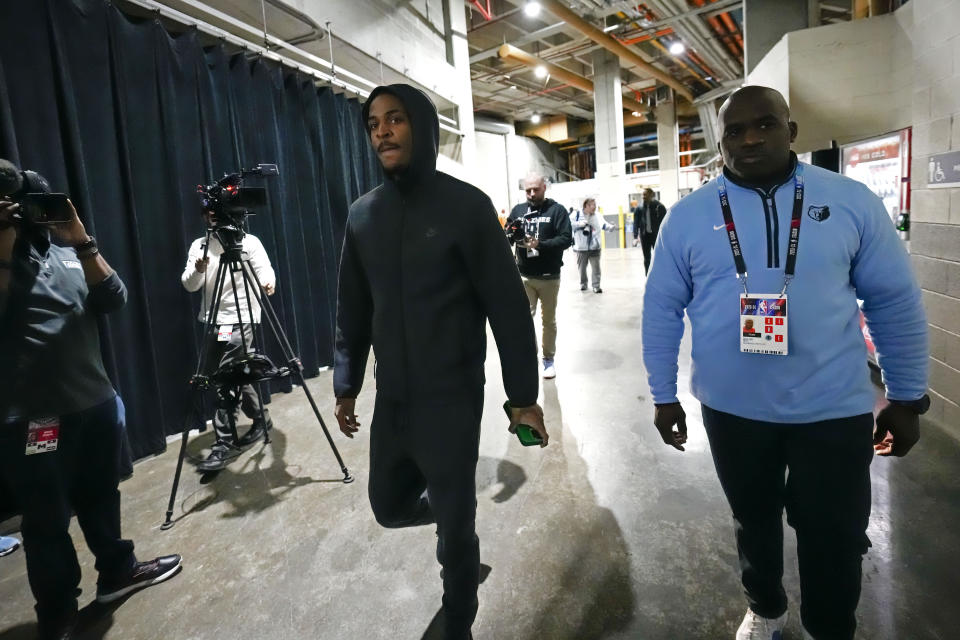 Memphis Grizzlies guard Ja Morant arrives at the Smoothie King Center for an NBA basketball game against the New Orleans Pelicans in New Orleans, Tuesday, Dec. 19, 2023. (AP Photo/Gerald Herbert)