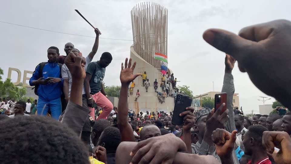 Supporters of the Nigerien defense and security forces demonstrate outside the national assembly in the capital of Niamey on Thursday.  - AFP via Getty Images