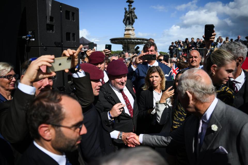 Charles greeting British veterans during a visit to Bordeaux (Daniel Leal/PA)