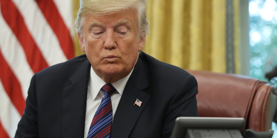 WASHINGTON, DC - AUGUST 27: U.S. President Donald Trump speaks on the telephone via speakerphone with Mexican President Enrique Pena Nieto in the Oval Office of the White House on August 27, 2018 in Washington, DC. Trump announnced that the United States and Mexico have reached a preliminary agreement on trade. (Photo by Win McNamee/Getty Images)