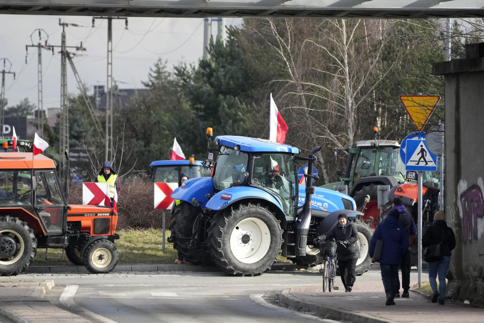 Polish farmers drive tractors in a convoy as they intensify a nationwide protest against the import of Ukrainian foods and European Union environmental policies, in Minsk Mazowiecki, Poland, on Tuesday Feb. 20, 2024. Farmers across Europe have been protesting recently, worried that EU plans to place limits on the use of chemicals and on greenhouse gas emissions will result in a reduction in production and income. They are also in revolt against competition from non-EU countries, in particular Ukraine. (AP Photo/Czarek Sokolowski)